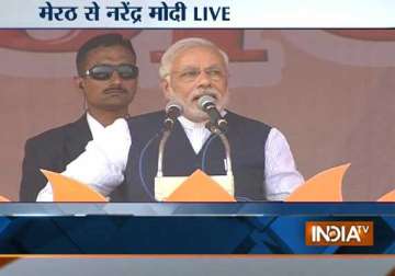 live it s congress and not bjp that is sowing seeds of poison says modi at meerut rally