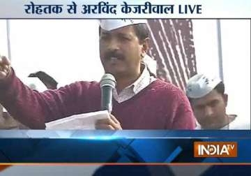live reporting hooda is a property dealer and not haryana cm says arvind kejriwal at rohtak rally