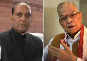 m m joshi in spat with bjp chief rajnath singh at party meet walks out