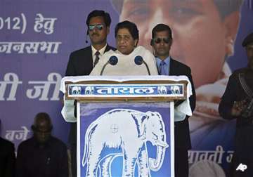 mayawati lashes out at congress says it is misleading people