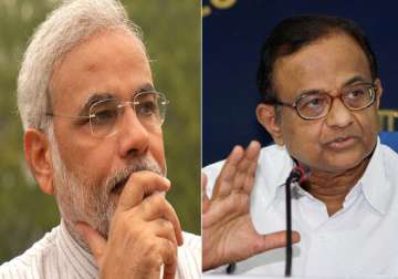 modi alleges distribution of watches with chidambaram s pics