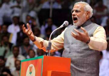 modi fires on all cylinders against mamata