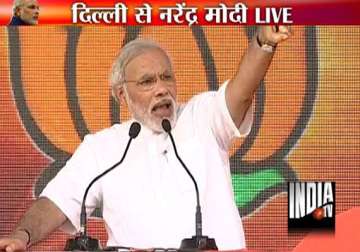 modi s delhi rally bjp s pm candidate slams rahul for undermining pm s authority