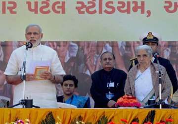 narendra modi takes charge of gujarat again for fourth term in a row