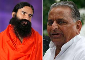 mulayam extends support to ramdev on black money issue
