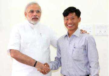 narendra modi reunites godson with his real parents