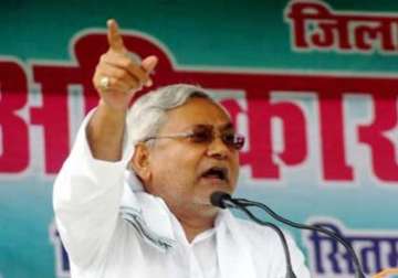 nitish seeks special status for bihar at delhi rally eyes national role