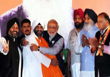 pm saddened by half brother s decision to join bjp