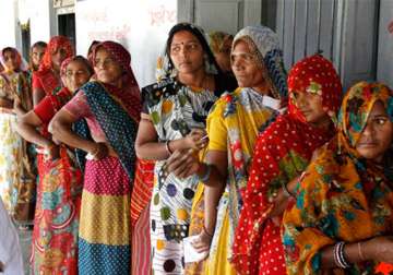 gujarat polls record 67 per cent turnout in modi versus rest battle