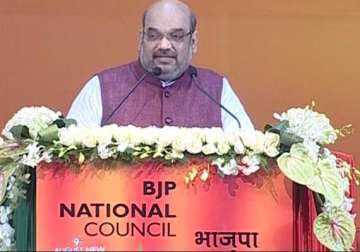 prepare for upcoming assembly polls in four states amit shah tells bjp workers