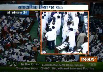 rahul gandhi leads opposition protests over communal tension in lok sabha