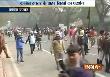 rahul s 1984 remarks sikhs protest outside aicc office in delhi