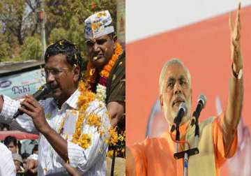 read catchy slogans coined by aap bjp for battle of varanasi for kejriwal modi