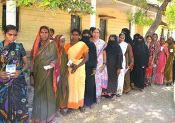 riven by graft karnataka votes sunday to elect new government