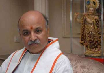 row over togadia s reported hate speech congress files complaint