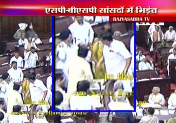 sp bsp mps come to blows inside rajya sabha over quota bill