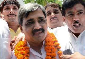 satish upadhyay formally takes charge as delhi bjp chief