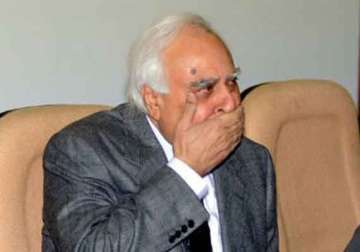 sibal opens his twitter account blunders by following anti congress account
