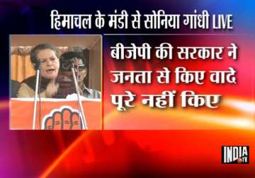 sonia kick starts poll campaign in hp attacks bjp