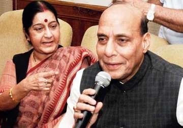 sushma denies being upset rajnath says party will decide advani s role
