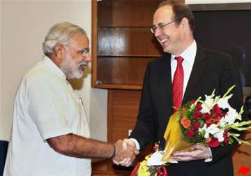 uk ends modi s boycott discusses economic cooperation