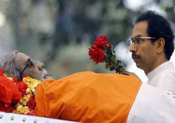 uddhav collects father s ashes