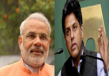 war of words between narendra modi and manish tewari over media advisory