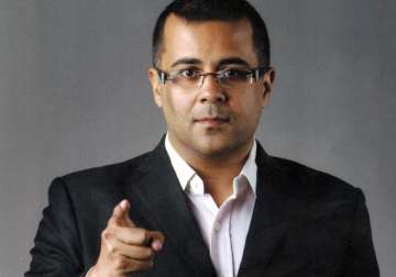 writer chetan bhagat lashes out at aap says snapdeals do not equal good governance