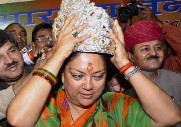 live reporting rajasthan polls vasundhara romps home demolishing congress