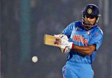 asia cup india survives late collapse to post 264/9 against sri lanka