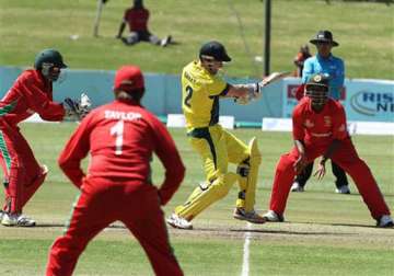 australia punishes zimbabwe bowlers to make 350