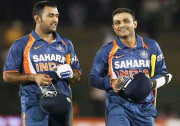 bcci steps in asks dhoni sehwag to ensure team unity