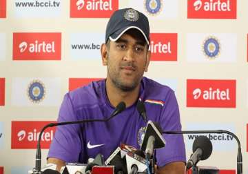 dhoni evades questions on ipl spot fixing with a smile