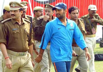 dhoni s security downgraded to y from z category