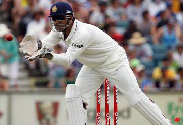 dhoni handed one match ban for slow over rate