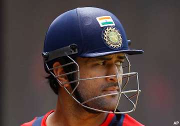 don t get carried away by hype dhoni cautions teammates