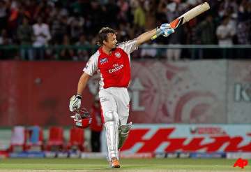 gilchrist smacks century in punjab s big win over rcb