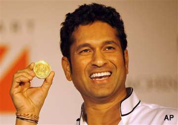 gold coins bearing sachin s face signature launched