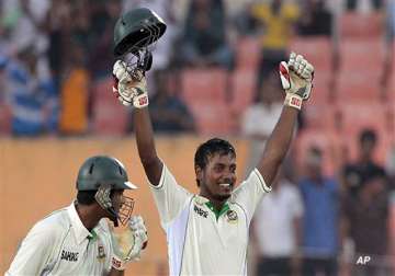 hasan lifts bangladesh with debut hundred