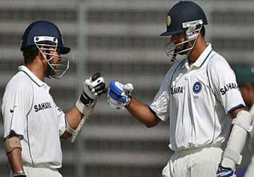 i ll miss dravid in the dressing room says sachin