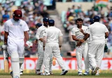 ind windies 1s test day1 west indies bowled out for 234