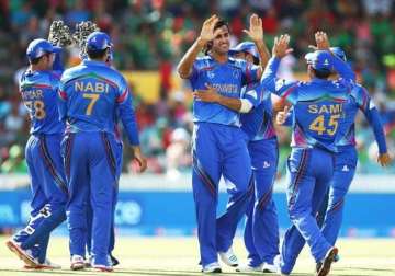 afghanistan beat scotland by 14 runs in world t20 qualifier