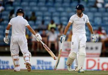 england 74 in reply to west indies 299 on day 2 of 2nd test