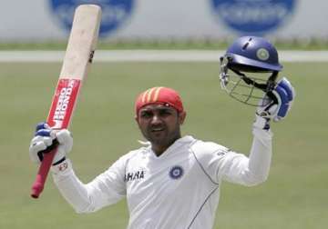 ranji trophy century at last for virender sehwag delhi in command