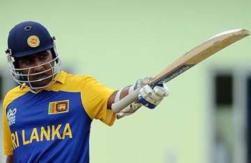 jayawardene century guides lanka to win against zimbabwe