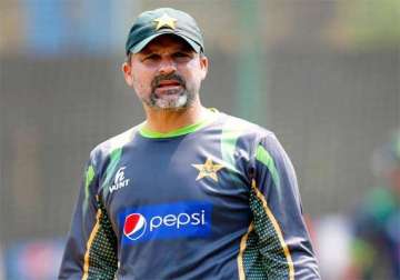 moin khan to continue his dual role says pcb chief