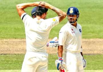 aus vs ind kohli johnson verbal volleys spice things up on day 3