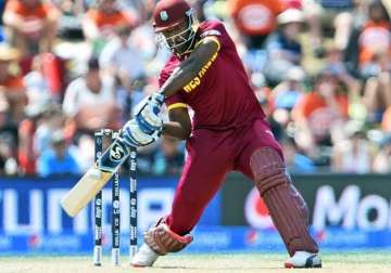 world cup 2015 west indies win toss elect to bat vs zimbabwe