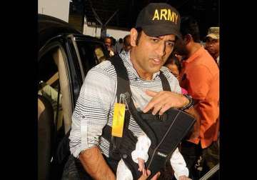 in pics india captain ms dhoni spotted with his daughter at ranchi airport