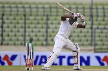 zimbabwe out for 368 before lunch on day 4